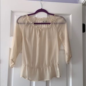 Tan sheer top,